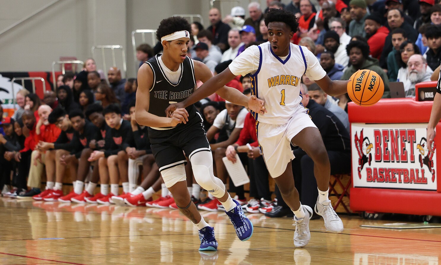 Warren's Jaxson Davis (1) dribbles the ball into the front court as Bolingbrook's Davion Thompson (3) defends, Lisle, Illinois. | Allen Cunningham for Sun Times